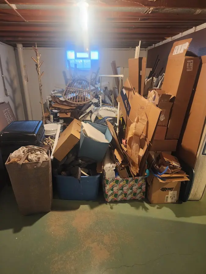 Roll-off dumpster container at job site for 20 Yard Dumpster Rental in Forsyth